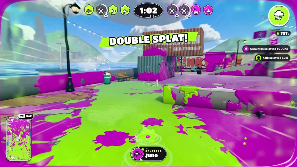 Splatoon-style ink shooter on a seaside boardwalk map