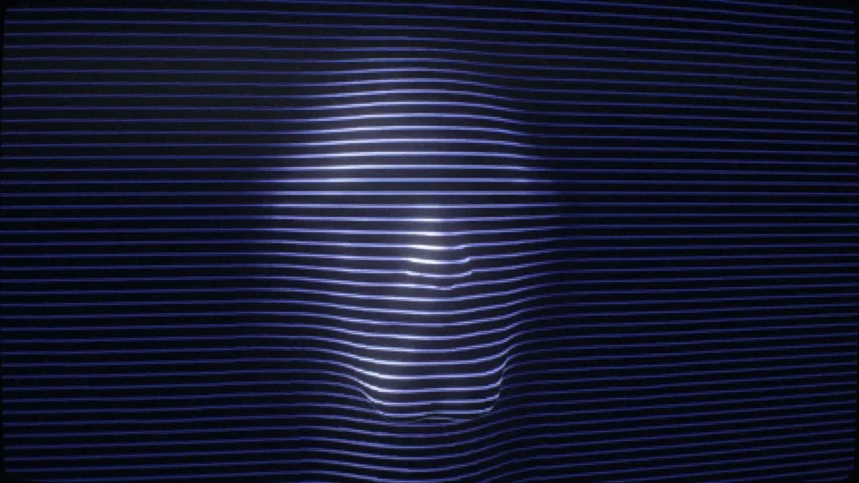 CRT scanlines outline a ghostly silhouette