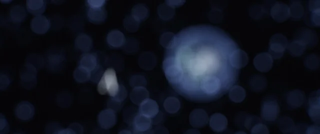 Microscopic blue sphere rendered purely from code